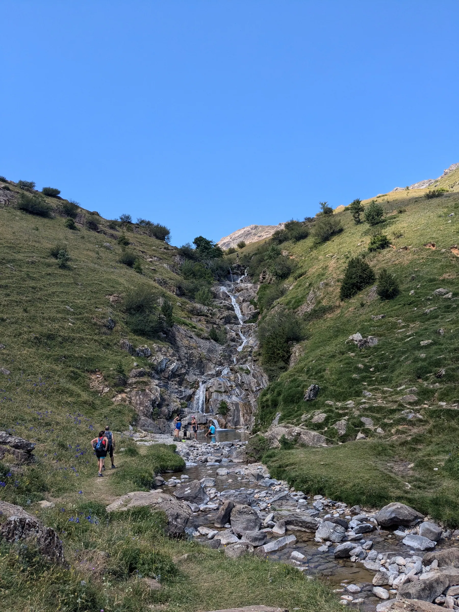 A cascading waterfall and stream in the Aragonese Pyrenees