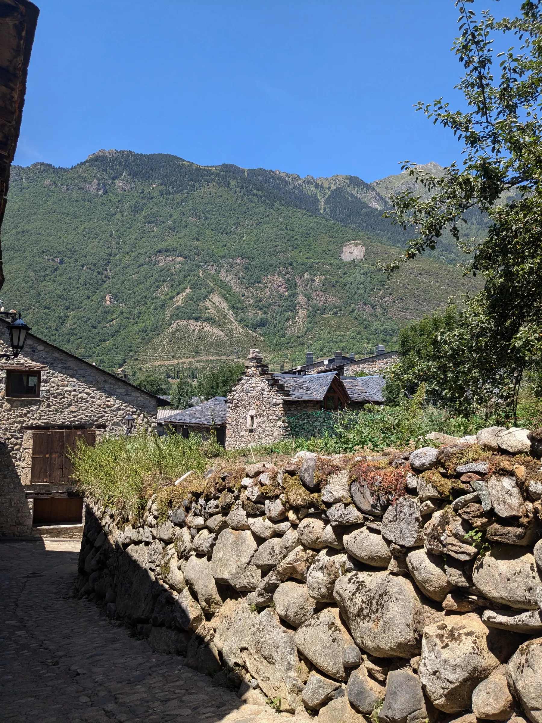 A traditional stone village street in the Benasque valley