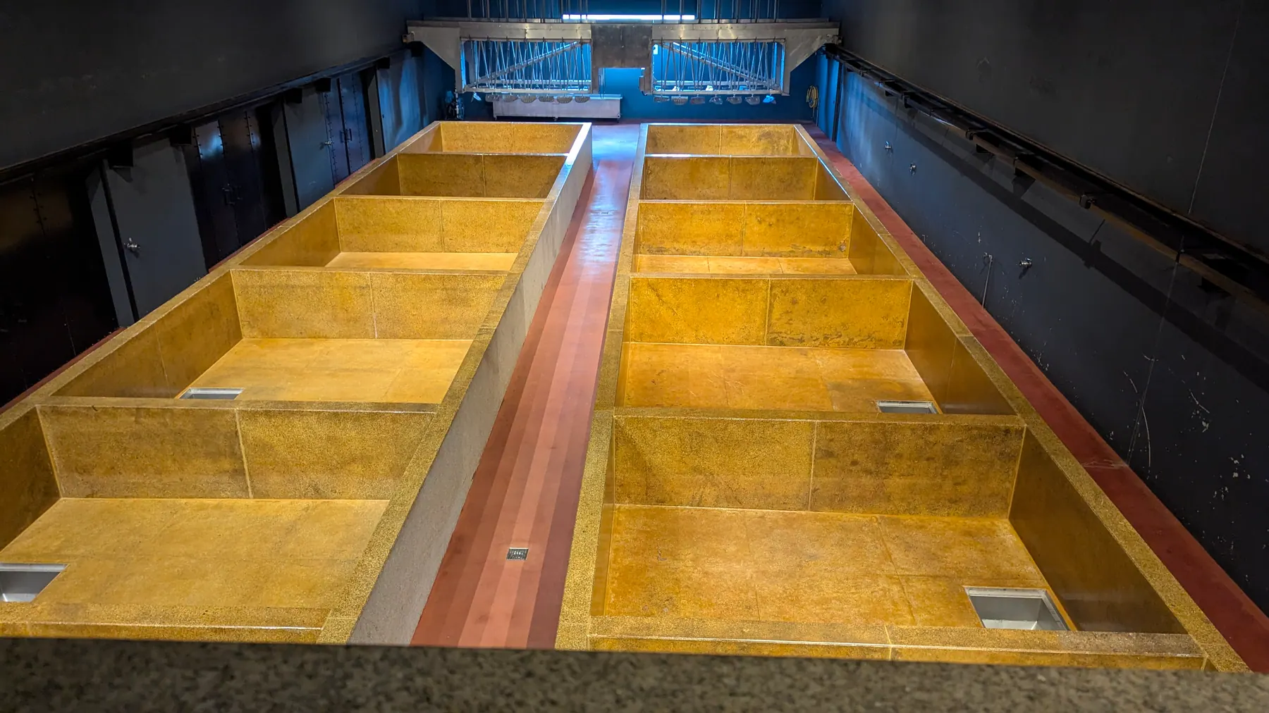 Large golden lagares inside the Quinta do Seixo production facility