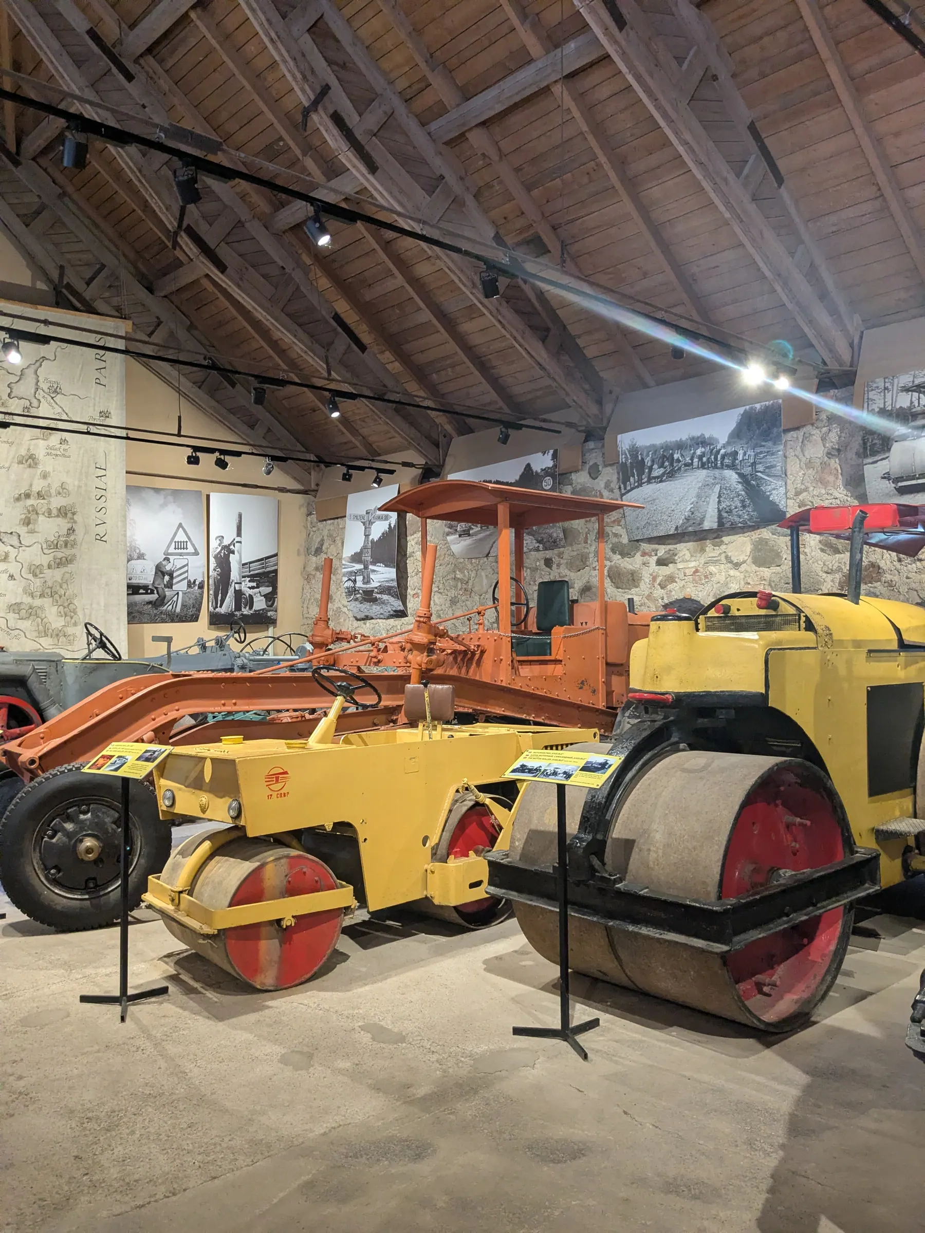 Historic road-building machinery inside the Latvian Road Museum