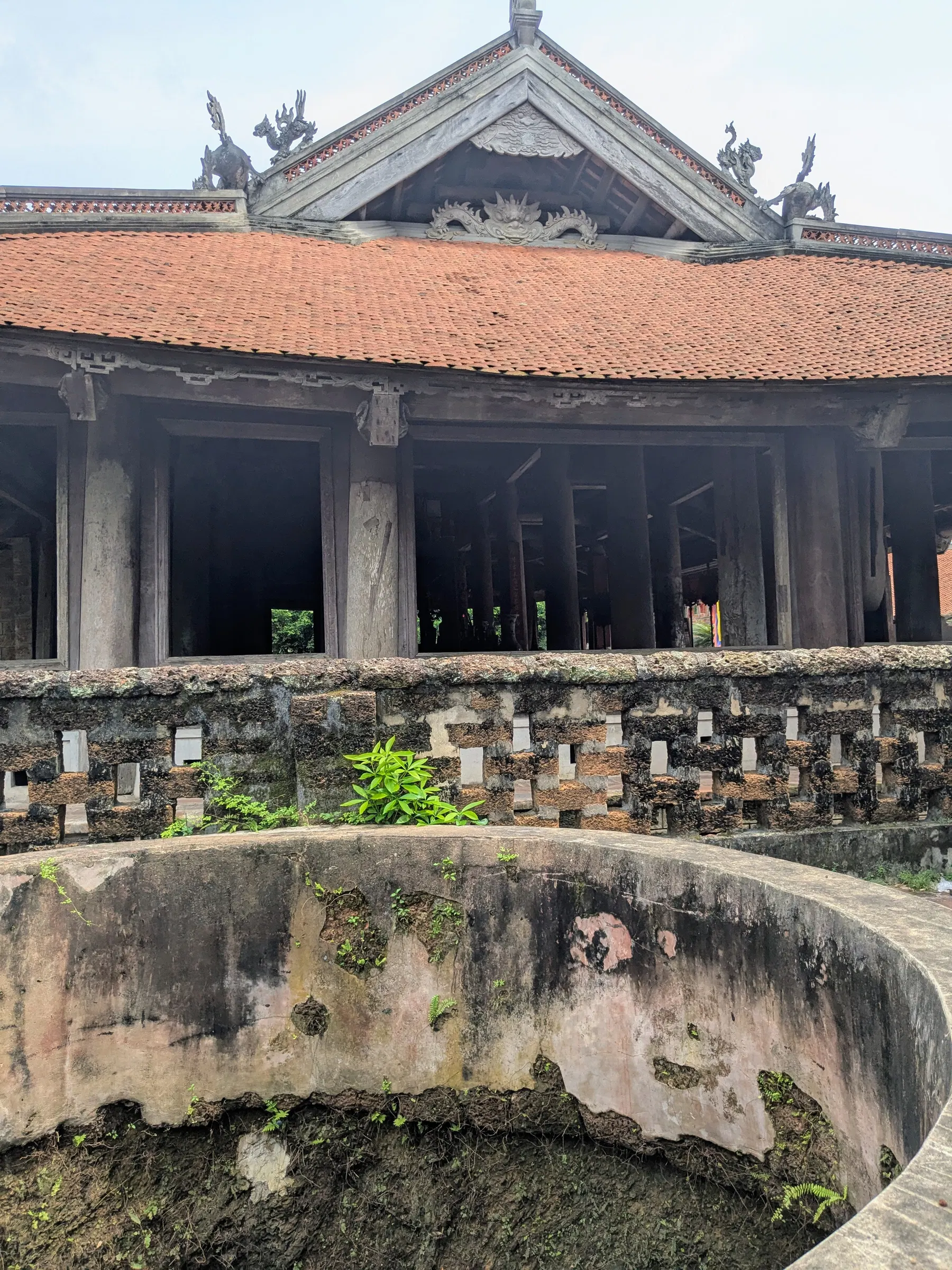 A weathered traditional temple building in Đường Lâm village