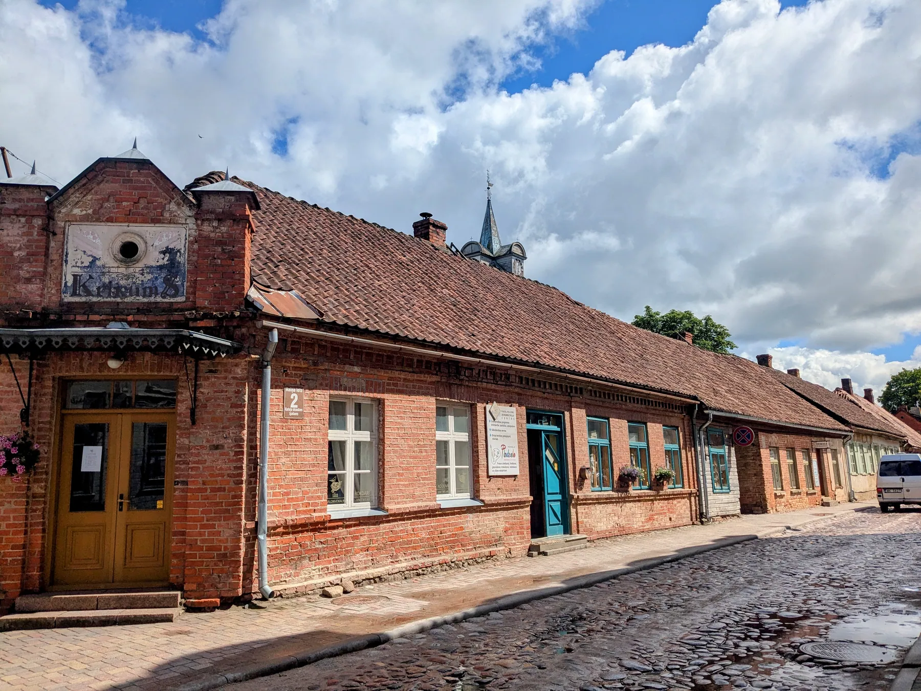 Historic red-brick buildings along Liepājas iela in Kuldīga