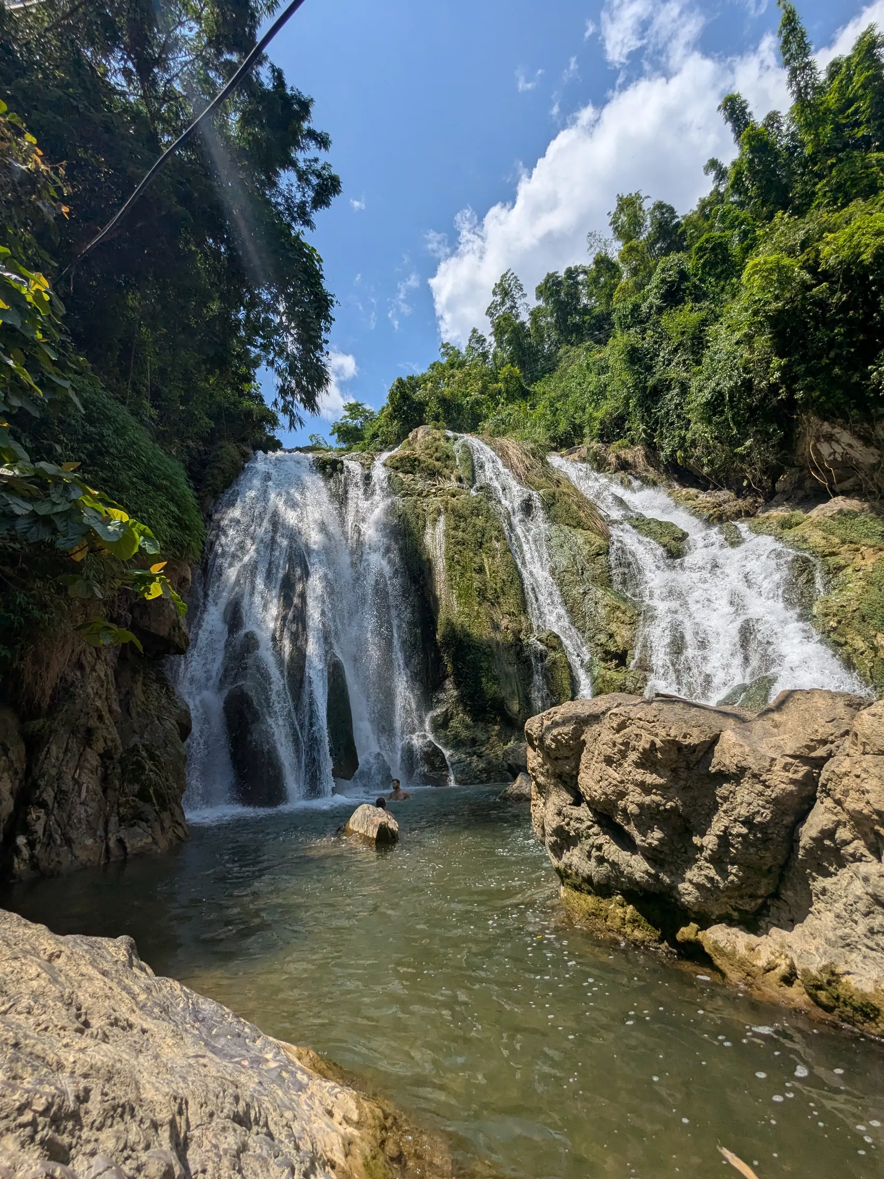 Gò Lào waterfall falling into a rocky pool