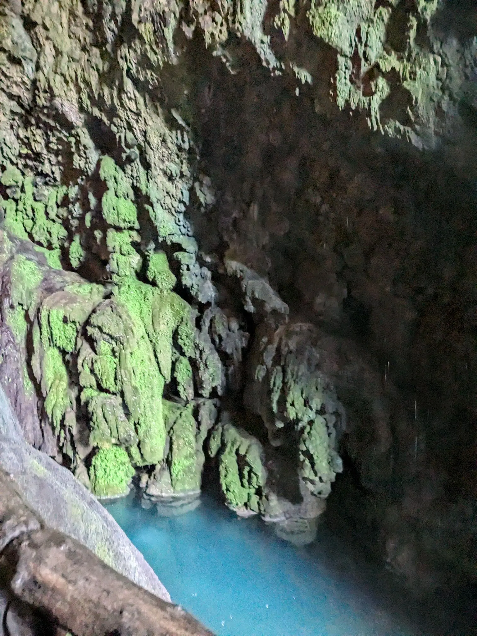 Blue-green water inside a cave at Monasterio de Piedra