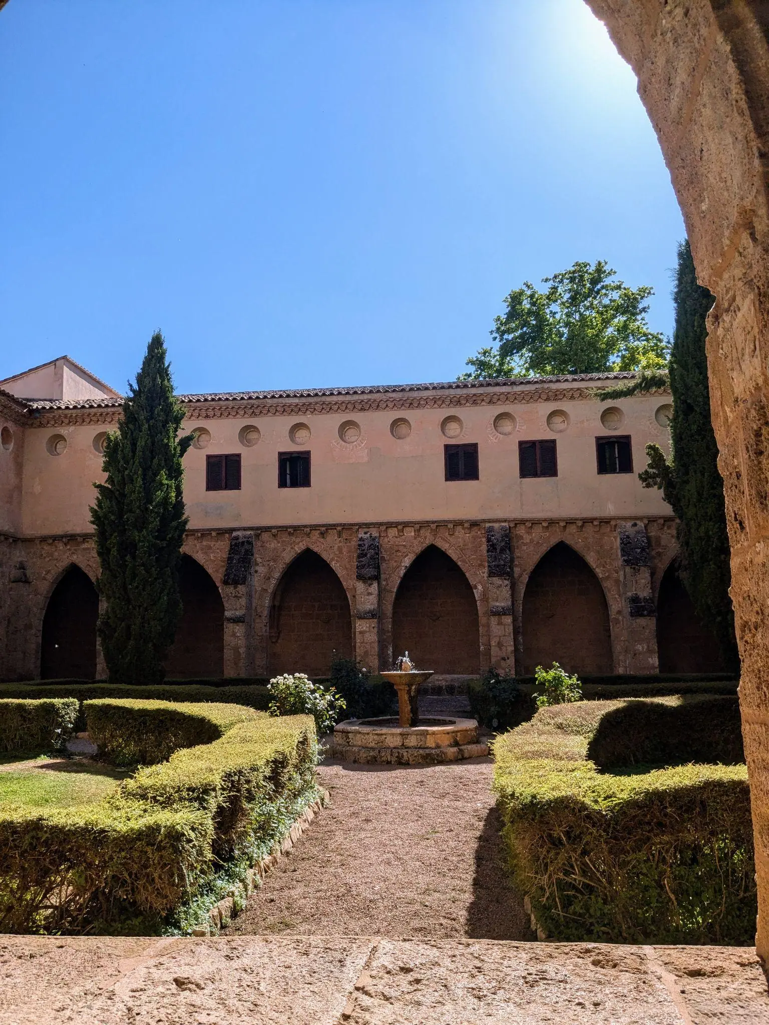 The courtyard and arches of the old monastery at Monasterio de Piedra