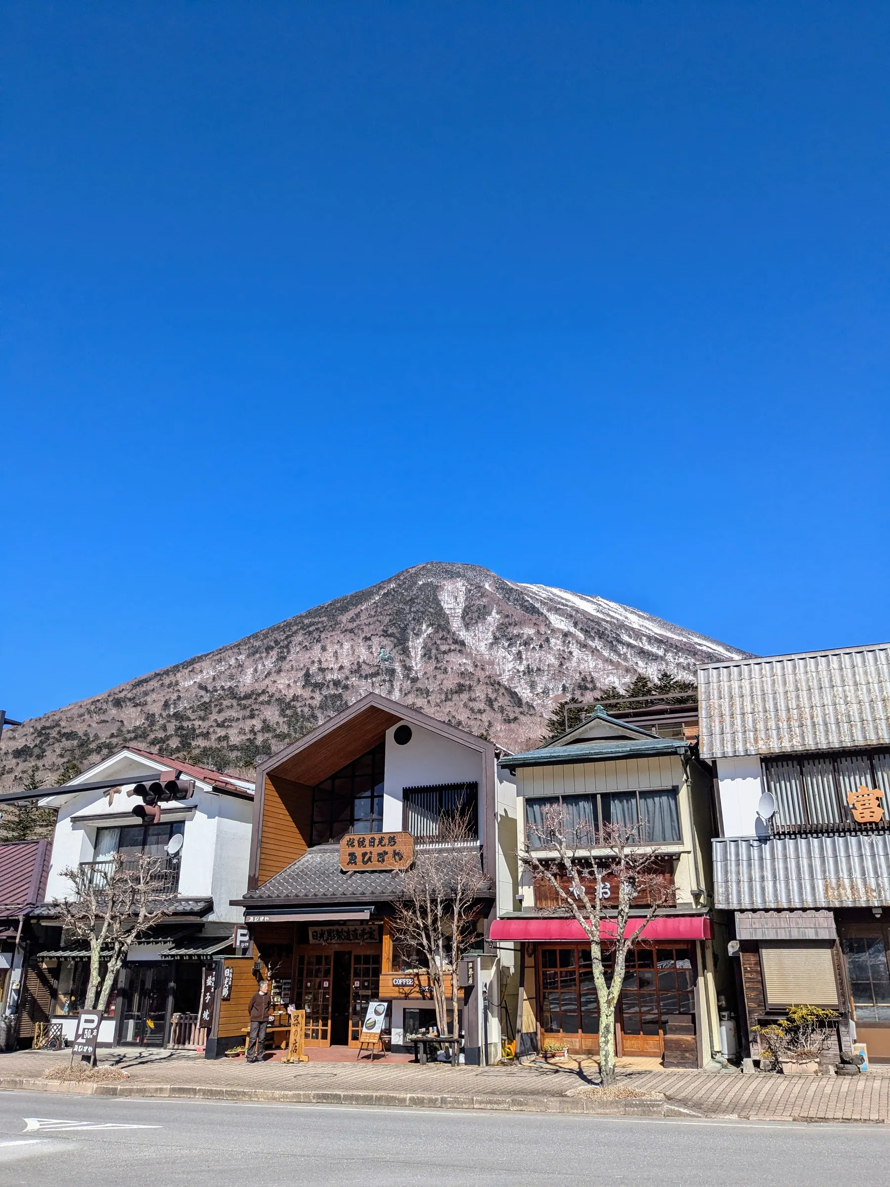 Snowy Nikko town with Mount Nantai in the background