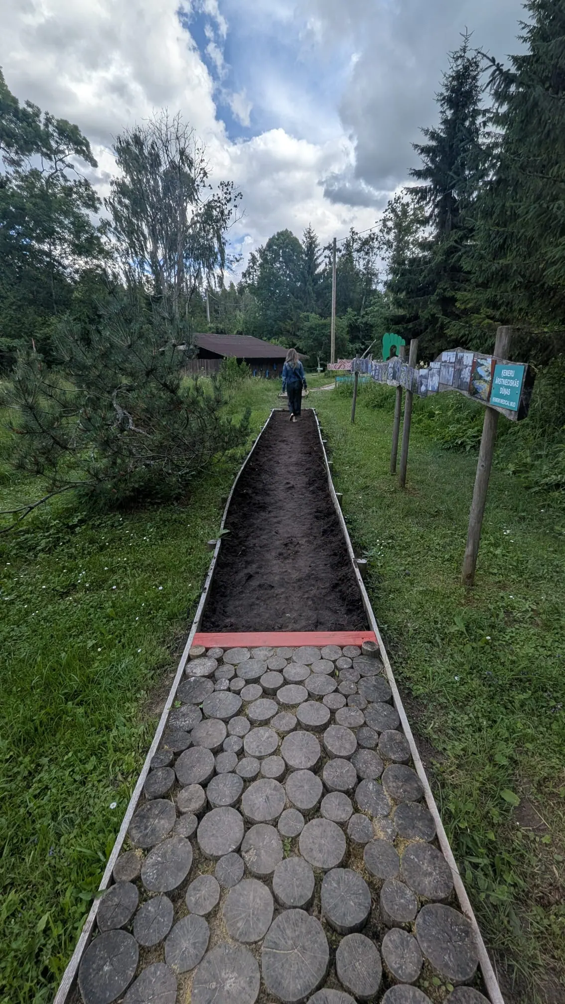 A textured barefoot-trail section at Valguma Pasaule