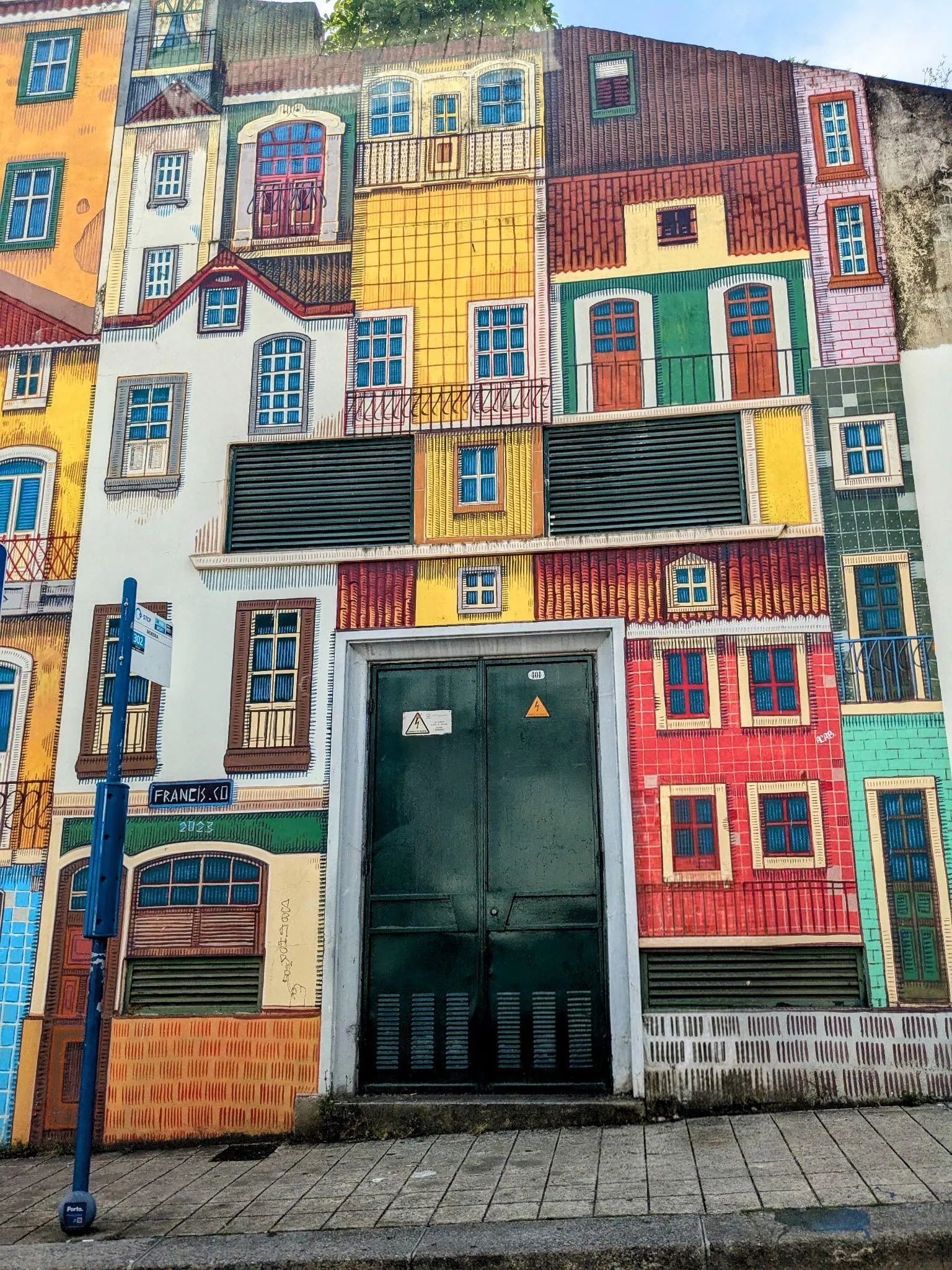 A colorful tiled facade on Rua de Alegria in Porto