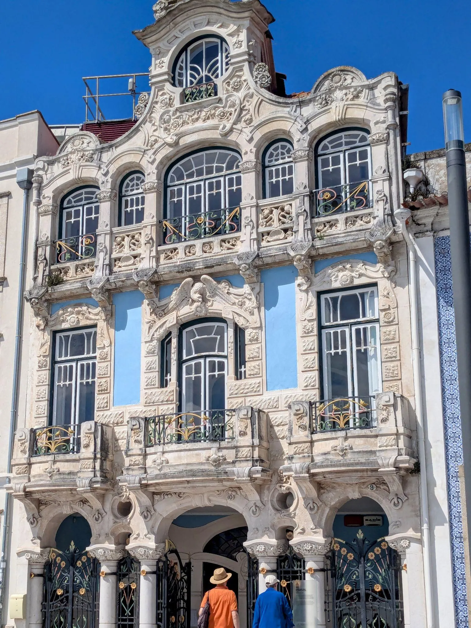 An ornate blue Art Nouveau facade in Aveiro