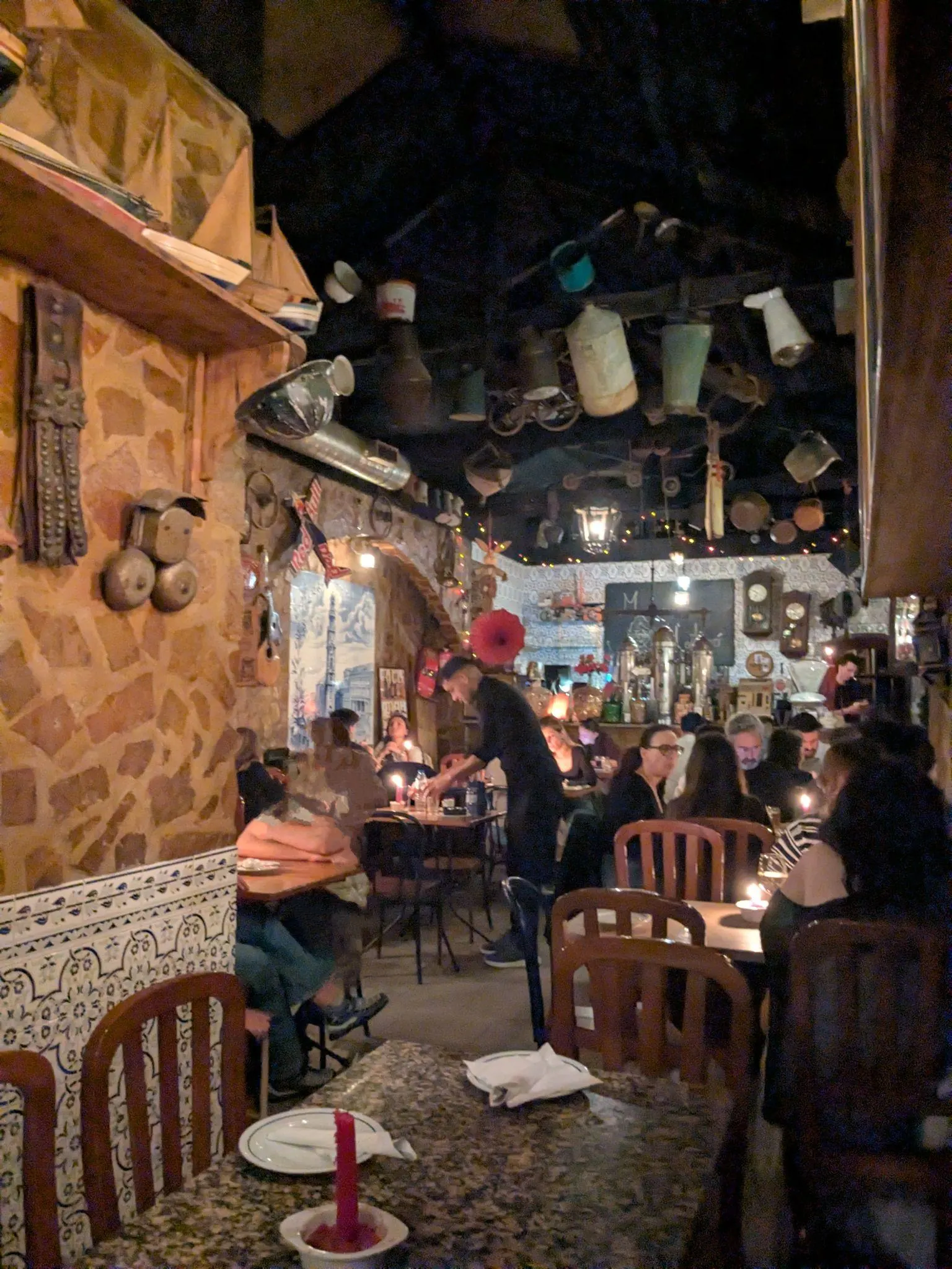 The warm rustic dining room at Museu d'Avo in Porto
