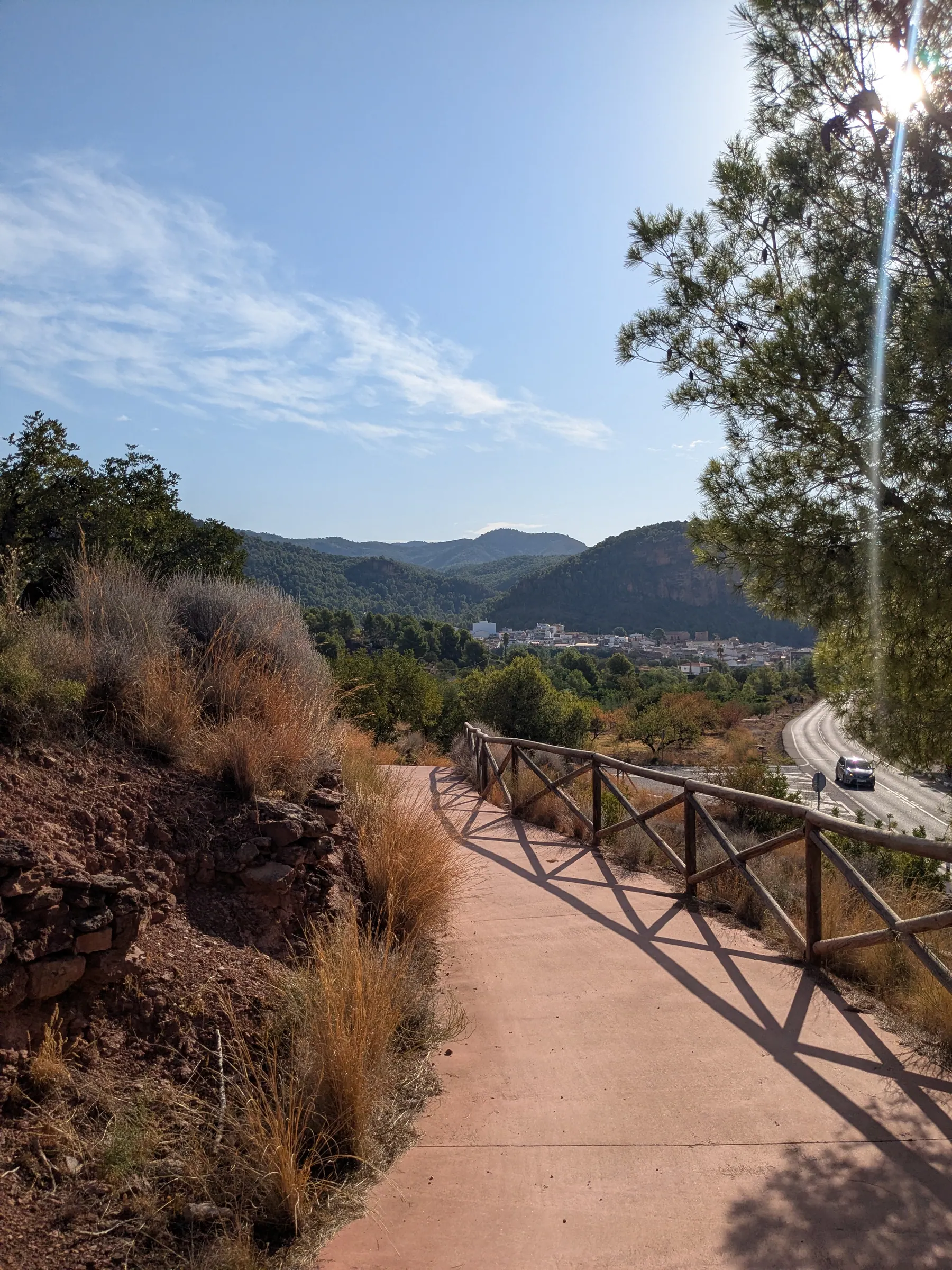 Wooden-railed path climbing through the Sierra Calderona toward Puntal dels Llops
