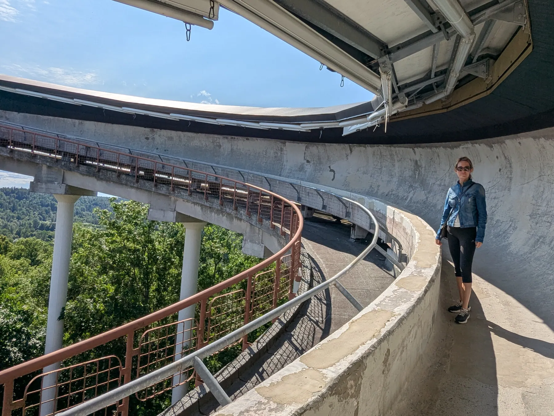 The concrete bobsleigh track at Sigulda beneath the trees
