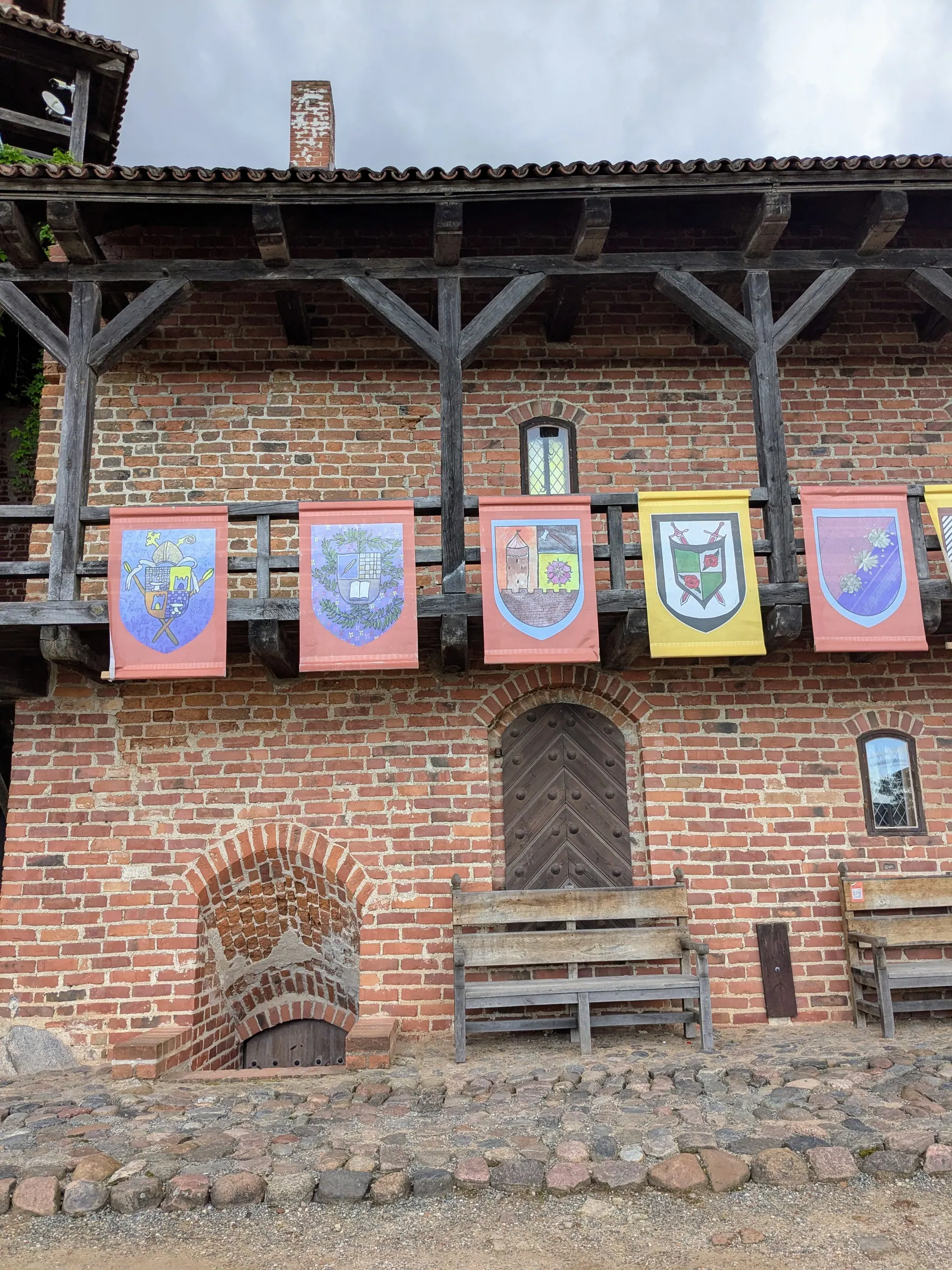 The red brick buildings and courtyard of Turaida Castle